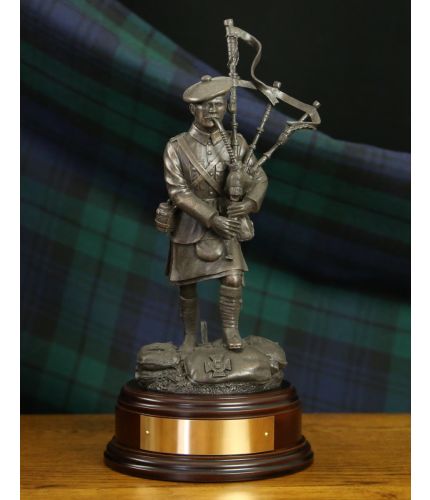 A regimental sculpture of Piper Laidlaw VC who won his Victoria Cross during the Battle of Loos in 1915. Laidlaw was a KOSB and our statuette makes a first class historical memorial. We include the wooden base and an engraved plate as standard.