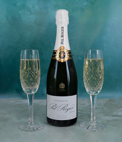 A bottle of Pol Roger Champagne and two fully cut crystal champagne flutes. We offer magnificent Pol Roger champagne gifts for your friends, family and colleagues. There is no engraving with this gift set.
