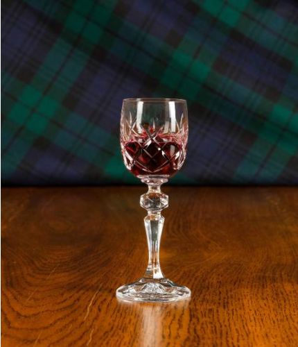 A single fully cut port glass, (no engraving is possible as this is fully cut). 
These glasses are like minature wine glasses with long stems and are perfect for serving port after dinner.