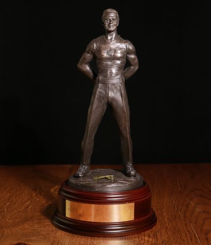 This is a sculpture of a Unit Physical Training Instructor. The sculpture can be made with either a plain base to have your own crest fitted, or with only the crossed sabres without crown of the RAPTC. Choice of base and free engraving