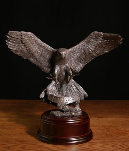 British Army Ranger Regiment sculpture of a Peregrine Falcon stooping for the kill. We offer a choice of finish, (silver, painted and bronze) wooden base and whichever base you choose we include a free engraved plate.