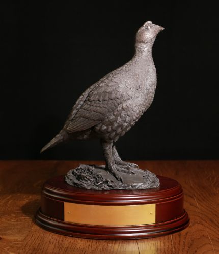 This is the 26cm tall Red Grouse sculpture. It is ideal to display on a mantle piece or bookshelf. We offer a choice of finishes & wooden bases and can add an engraved plate if required.