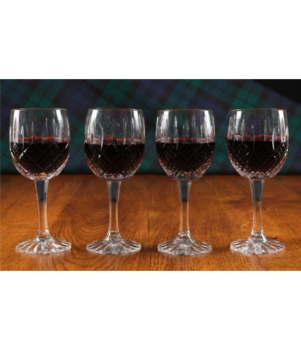 A Set of Four Fully Cut Crystal Red Wine Glasses presented in a lovely gift box. An ideal gift to commemorate a very special occasion. No engraving is possible on fully cut crystal.