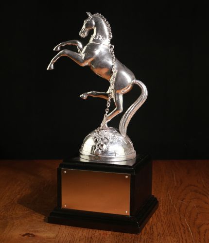 A lovely 11" tall REME retirement gift. The REME horse is cast in pure lead free pewter and the base is finished in electro-sterling silver. We only supply this statue on this black mahogany base.