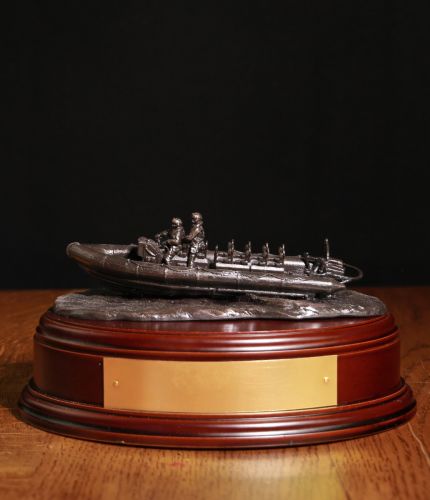 RIB Raiding Craft presentation piece, the wooden base and an engraved brass plaque are included free of charge.