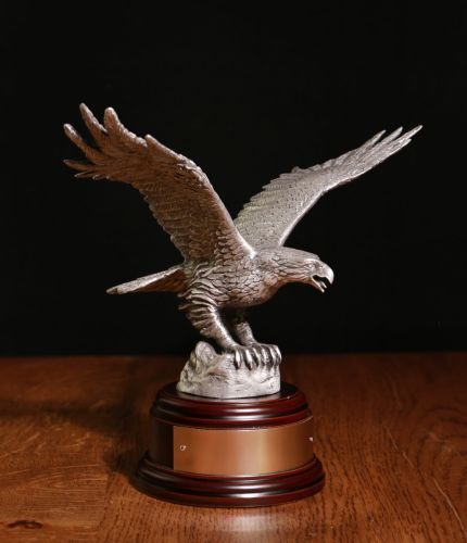 This is a hand buffed, pure pewter, Royal Air Force Eagle sculpture. There are various wooden base options and we include a Nickel Silver Engraved plate if required.