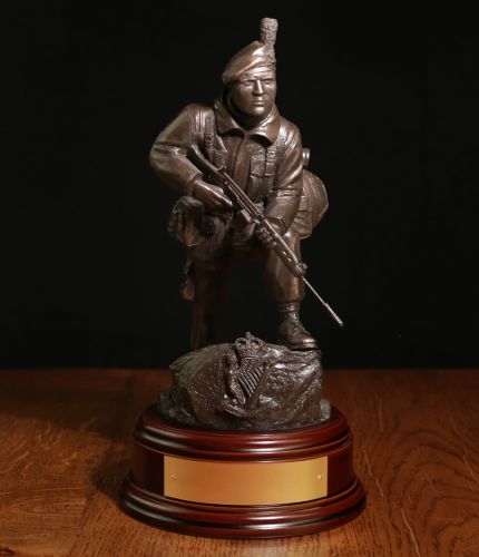 Royal Irish Ranger soldier with an SLR Rifle and 58 Pattern Webbing in an alert pose wearing a Caubeen. Handmade in a bronze finish, he is sculpted to an 11" scale. We offer a choice of base, with free engraving