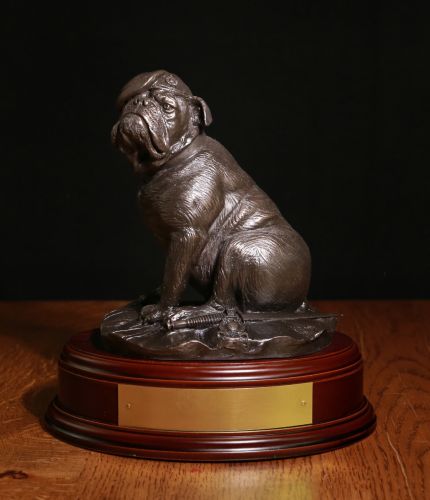 A Cold Cast Bronze Royal Marine Bulldog. He's wearing a Royal Marine Beret and has a traditional Sykes Dagger at his feet.  We offer a choice of bases and include a fully engraved brass plate with this sculpture. 