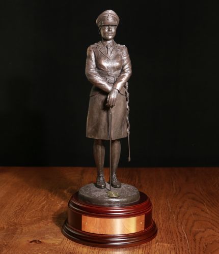 A female Sandhurst Cadet. We can complete the sculpture with a choice of badge, finish and wooden base. We also offer a fully engraved nameplate on the front of the base. Please note, the silver version is hallmarked.
