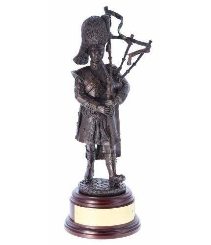 Royal Scots Dragoon Guards Pipe Major. Cold Cast Bronze in an 8 Inch Scale. We provide this wooden base and and engraved brass plate as part of the service