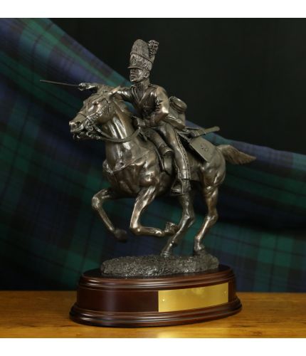 Charge of the Royal Scots Greys during the Battle of Waterloo in 1815. This is our 14 inch tall cold cast bronze display sculpture. We offer a choice of wooden base and a free engraved plate with your order.