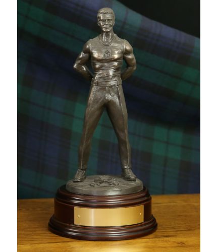This is a sculpture of a Physical Training Instructor from the Royal Army Physical Training Corps. We offer a choice of wooden bases and a free engraved brass plate.