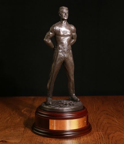 This is a sculpture of a Physical Training Instructor from the Royal Army Physical Training Corps. We offer a choice of wooden bases and a free engraved brass plate.