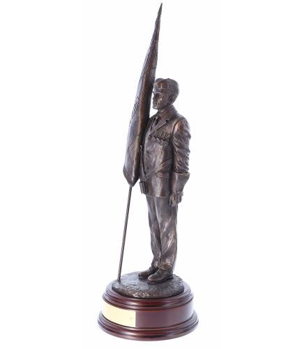 This is our 12" scale Royal British Legion Scottish Standard Bearer with Glengarry. We can add your regimental cap badge to the base by his feet. We offer a choice of wooden bases and free engraving. 