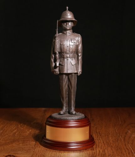 8" Scale sculpture of a modern (SA80) Royal Marine in full parade dress with distinctive pith helmet. We offer a choice of finishes and wooden bases. We also offer a free engraved brass plate as standard.