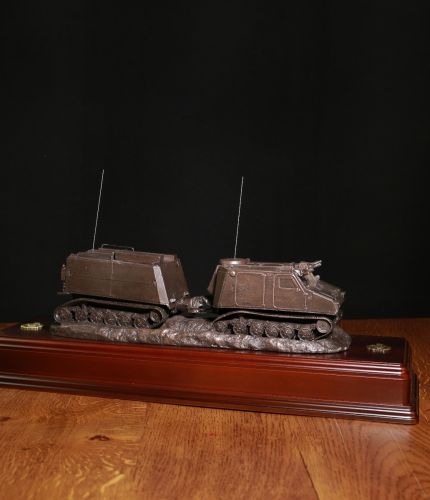 Royal Marine Arctic Warfare Viking Troop Carrier. The sculpture is mounted on a wooden base which is designed to take an engraved plate. It makes an ideal military farewell gift or commemorative piece.