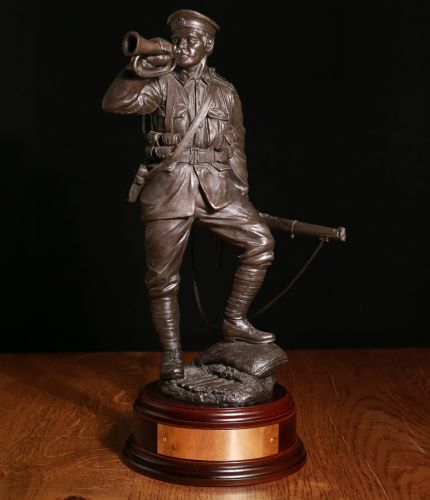 Royal Marine World War 1 Light Infantry Bugler. This is a 12 inch scale historical WW1 statue within the Royal Marines. We include a choice of wooden bases and an engraved brass plate as standard.