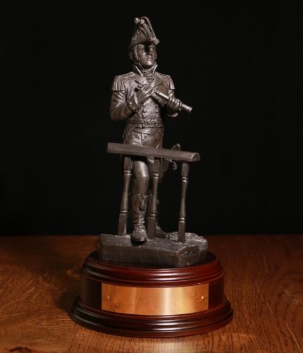 Royal Navy Seagoing Captain from the Napoleonic Wars. This 8" scale statuette makes the perfect Royal Navy Wardroom farewell or retirement gift to any Officer in the Royal Navy. We include the wooden base and brass plate.