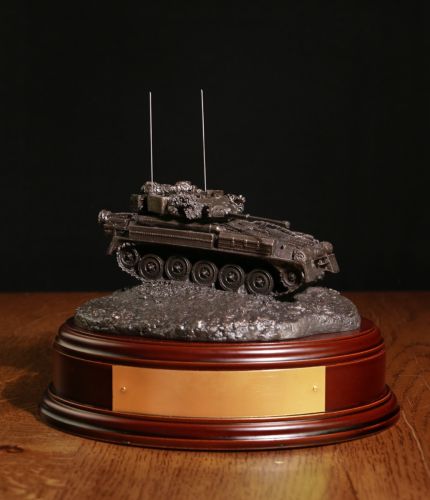 British Army Scimitar Recce Vehicle in the cold cast bronze finish. We mount it on a choice of wooden base and you can have the badge of your choice. We also offer a free engraved brass plate on the wooden base