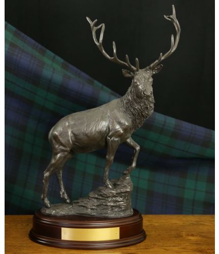 This is our antique bronze sculpture of a 17" tall, 11" wide and 6" deep Highland Stag. We manufacture it ourselves here in Walkerburn and offer a choice of base and engraving options.