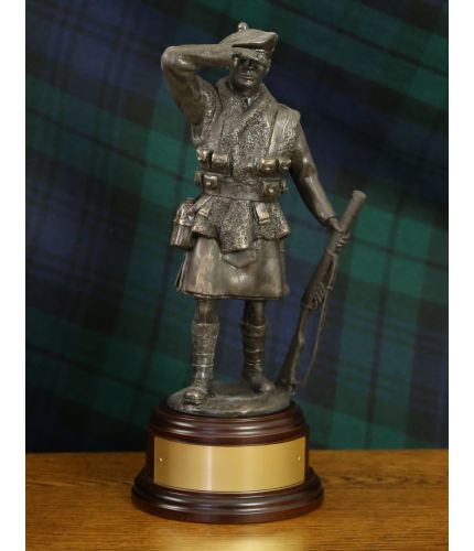 This is an 8" tall scaled down replica of the Dornoch War Memorial which depicts a World War 1 kilted soldier of the 51st Highland Division. We offer an engraved brass plate as standard with this scupture.