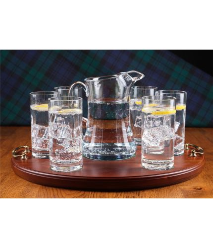 This is a 7 piece tray set consisting of a water jug, six crystal highball tumblers with a brass handled serving tray. It can be left plain or engraved. We can add a free engraved brass plate to the serving tray.