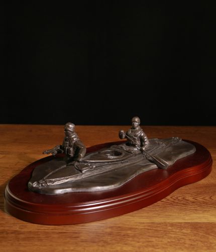 A Sculpture of a Modern Special Forces Canoe Team in front line service. This is the cold cast bronze version. We include an engraved brass plate