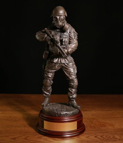 Commemorative military sculpture of a Special Forces Trooper on Counter Terrorism Operations. 12" scale and made in cold cast bronze resin. If required, we offer an engraved plated free of charge.
