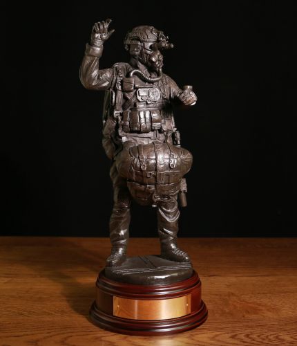 This is the new 2023 Special Forces HALO Paratrooper. It features a Special Forces Trooper ready for a HALO parachute jump. It is sculptured in our 12" scale and we offer a choice of bases and free engraving.