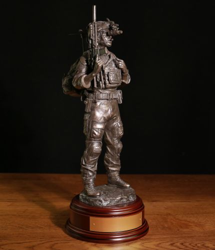 A modern Special Forces Standing Signals Communicator in front line service. The statue stand 12" tall and we include the wooden base and an engraved brass plate as standard. The perfect gift idea for anyone who's served in a signals role