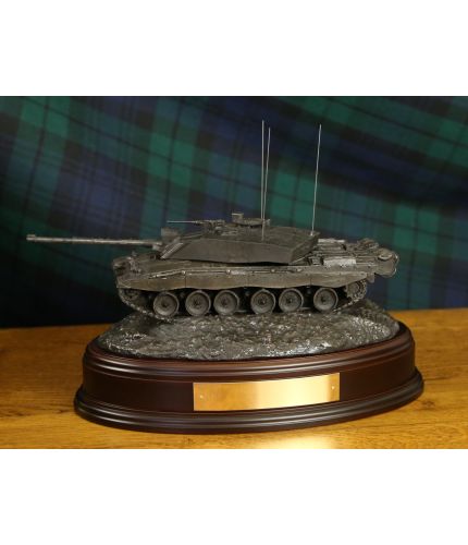 This is a Cold Cast Bronze model of a Challenger 2 Main Battle Tank set up for the Sultan of Oman's Army. The sculpture is mounted on a wooden base and we can add an engraved plate.
