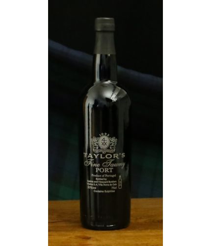 An engraved bottle of Taylors Fine Tawny Port. We include the design, setup pre-approval and engraving service as part of this product. Taylors port makes an excellent gift idea for weddings, christenings, anniversaries, at Christmas and for a birthday