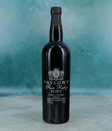 An engraved bottle of Taylors Fine Ruby Port. We include the design, setup pre-approval and engraving service as part of this product. Taylors port makes an excellent gift idea for weddings, christenings, anniversaries, at Christmas and for a birthday