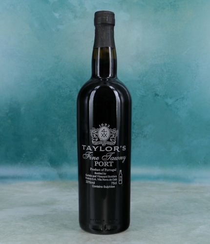 An engraved bottle of Taylors Fine Tawny Port. We include the design, setup pre-approval and engraving service as part of this product. Taylors port makes an excellent gift idea for weddings, christenings, anniversaries, at Christmas and for a birthday