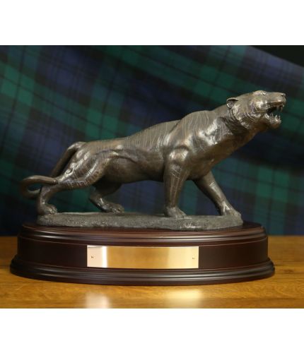 This a lovely cold cast bronze sculpture of a Male Tiger in a snarling pose. We include the wooden base as seen and an engraved brass plate as part of the standard service.