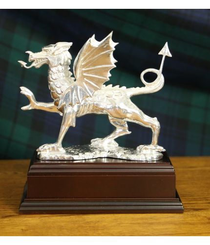 Welsh Dragon in polished lead free pewter. A Classic Welsh Dragon, perfect for a Welsh farewell or retirement. It's hand made here in our factory and we offer it on a choice of wooden bases. The engraving plate is provided free of charge.