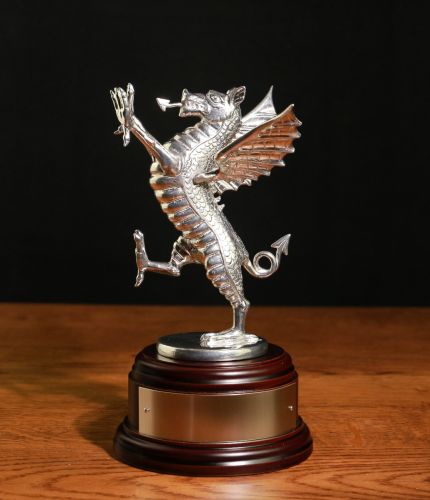 Royal Welsh Pewter Welsh Dragon Rampant. Mounted here on either a mahogany or standard wooden base. We include and engraved nickel silver plate.