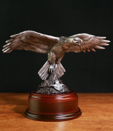 This is a hand buffed, pure pewter, Royal Air Force Eagle sculpture. There are various wooden base options and we include a Nickel Silver Engraved plate if required.